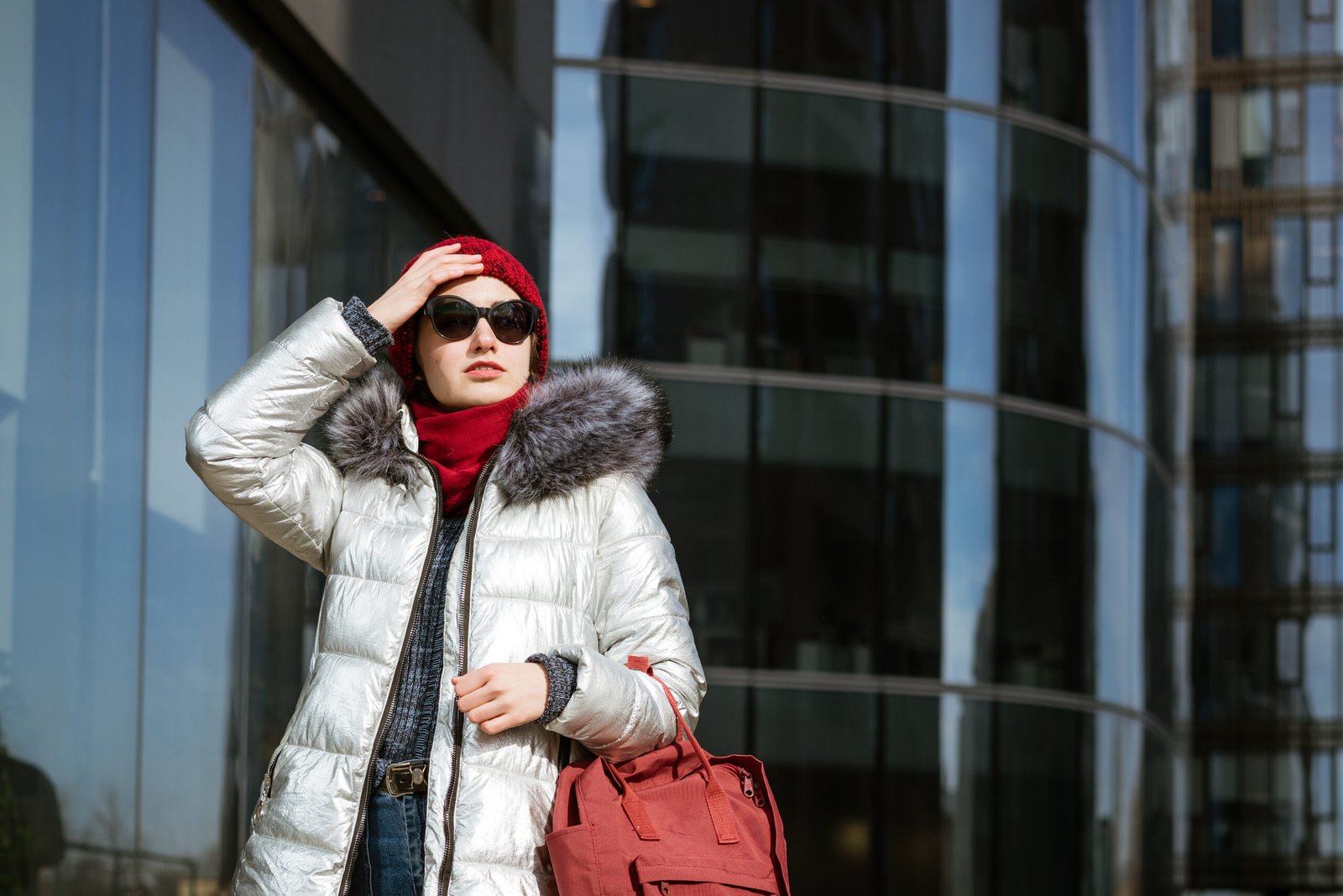 happy young woman in winter jacket with backpack n 2024 12 02 17 51 18 utc scaled